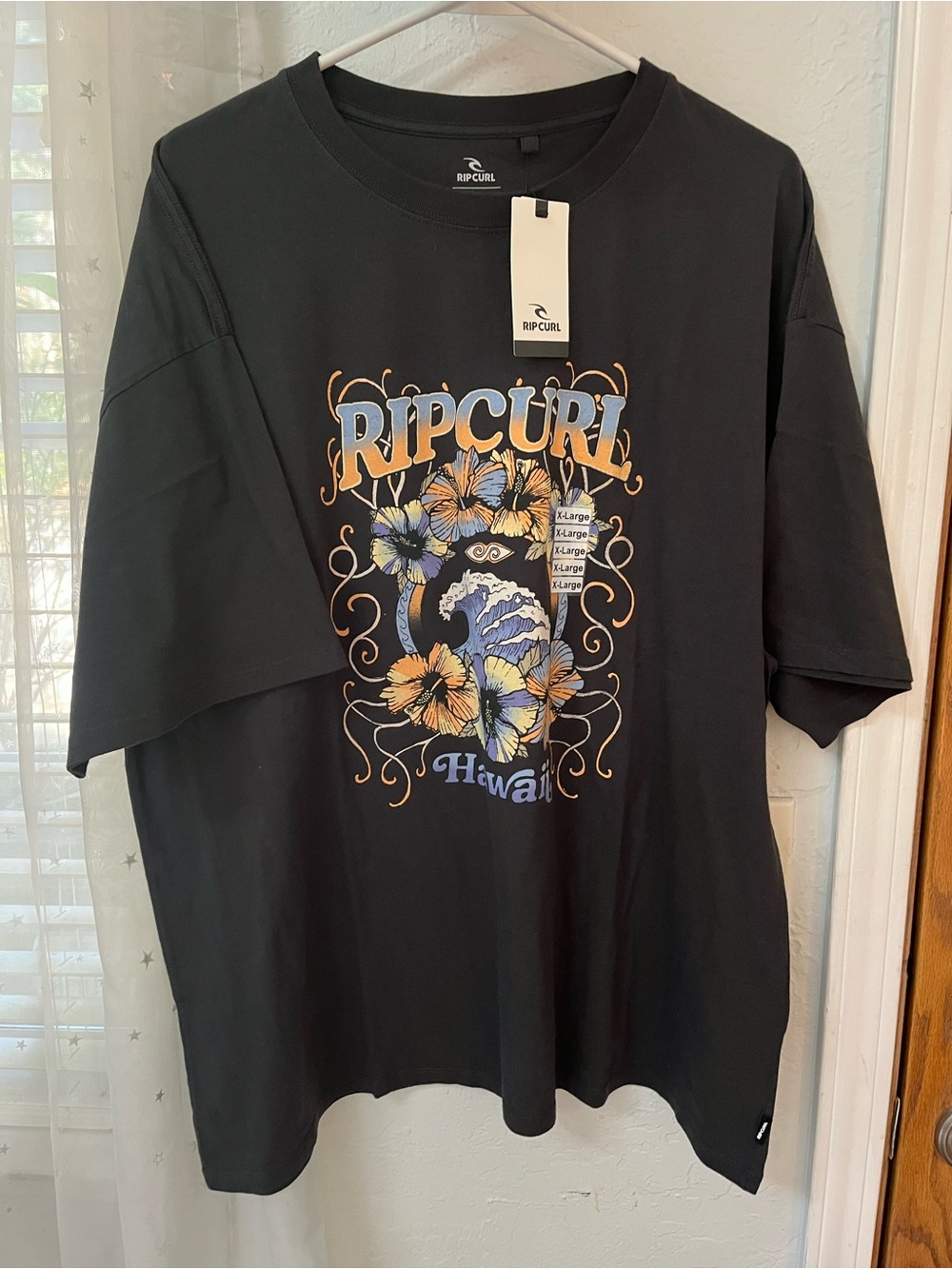 Rip Curl Black Short-Sleeve Tee with Floral Wave Graphic